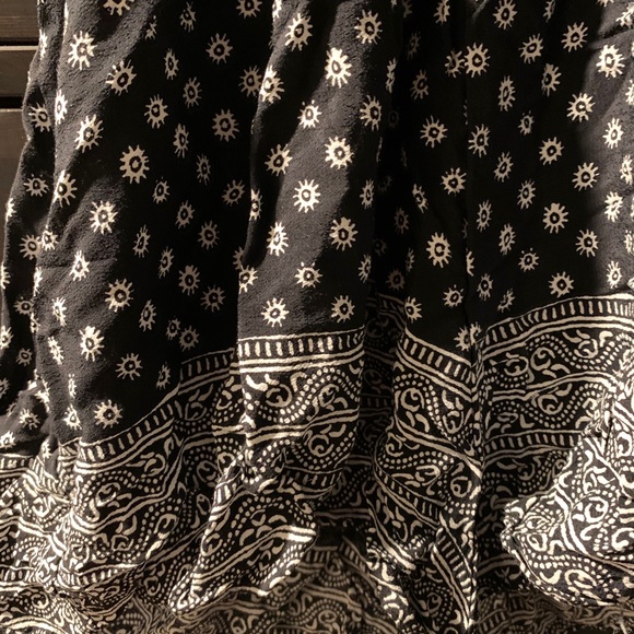 Olivaceous Black and White Halter Floral Patterned Romper - Picture 4 of 9